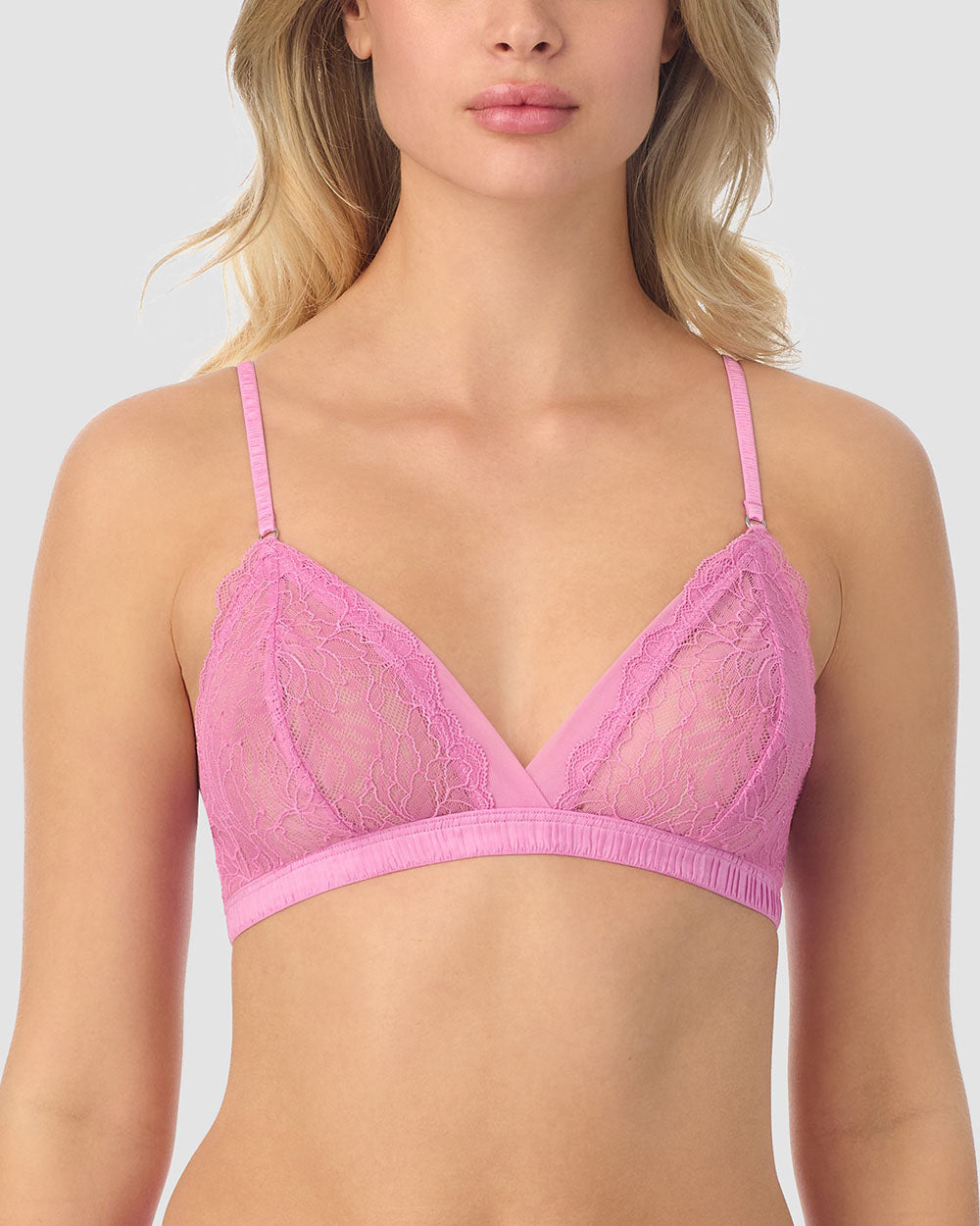 A lady wearing Pink Berry Luxe Lace Bralette