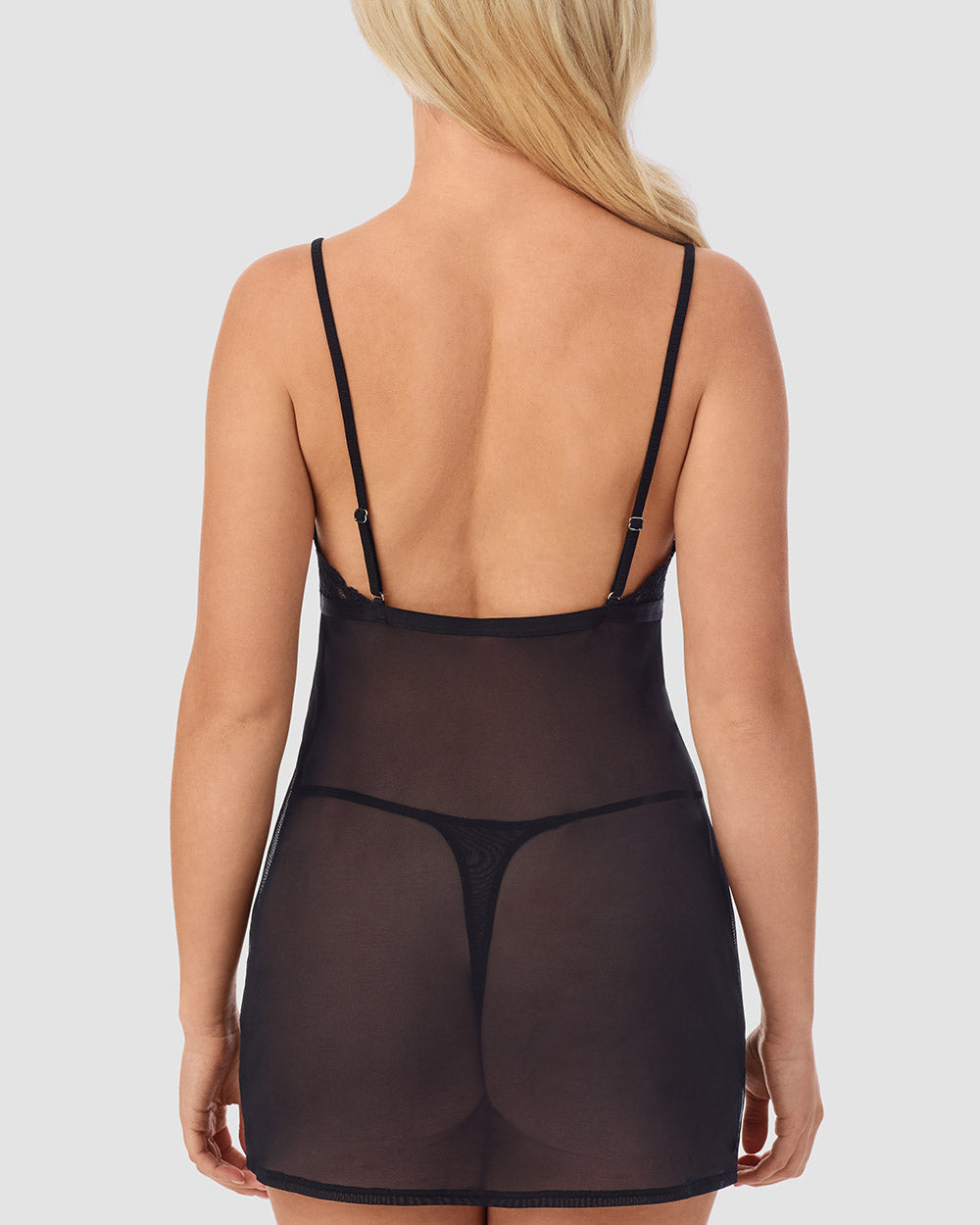 A lady wearing black Luxe Lace Chemise/String Thong Set Closer back view