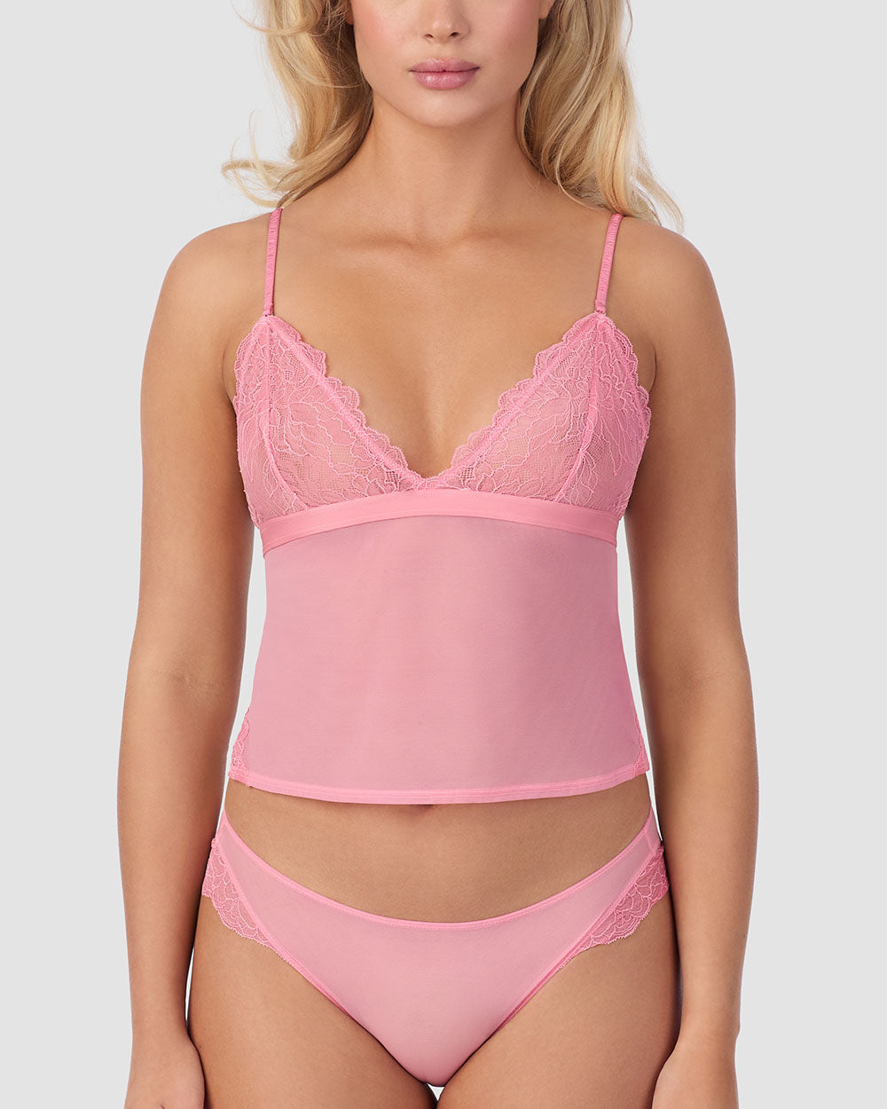 A lady wearing Luxe Lace Triangle Cami in Plumeria