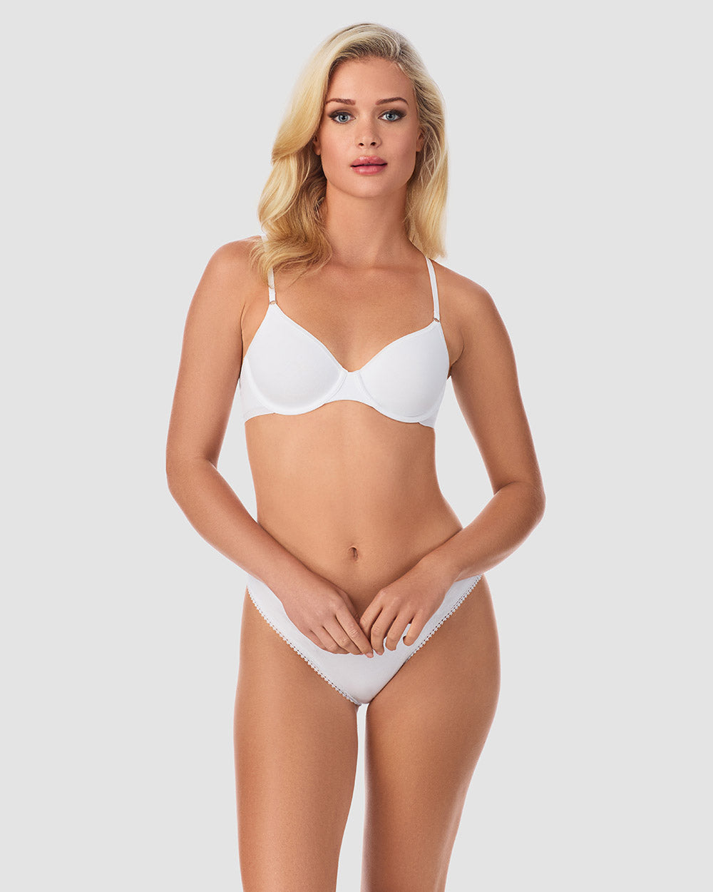 A lady wearing a white Cabana Cotton Unlined Underwire Bra