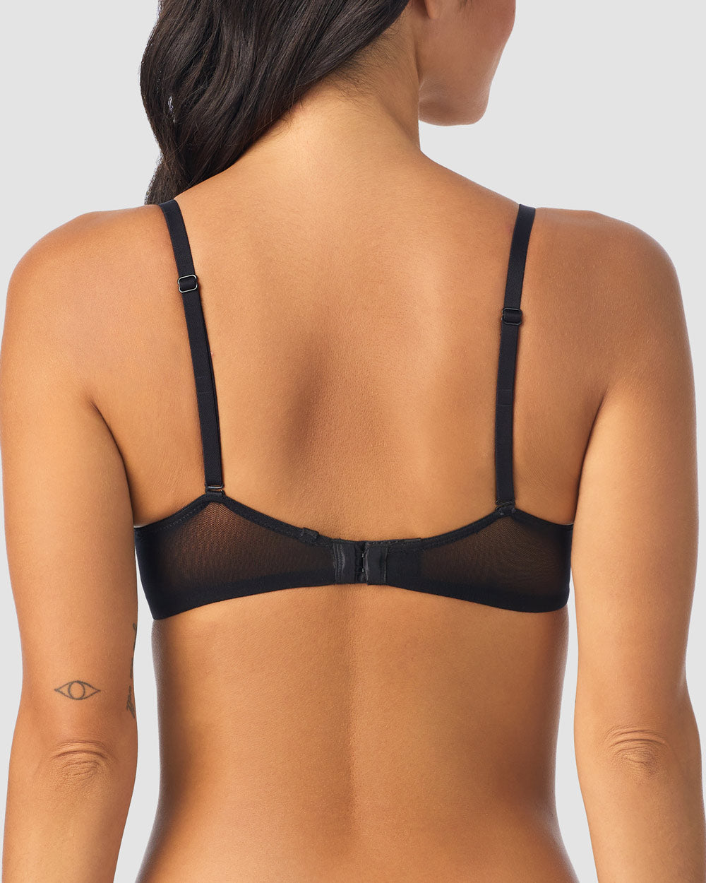 A lady wearing Black Gossamer Mesh Convertible T-Shirt Bra
