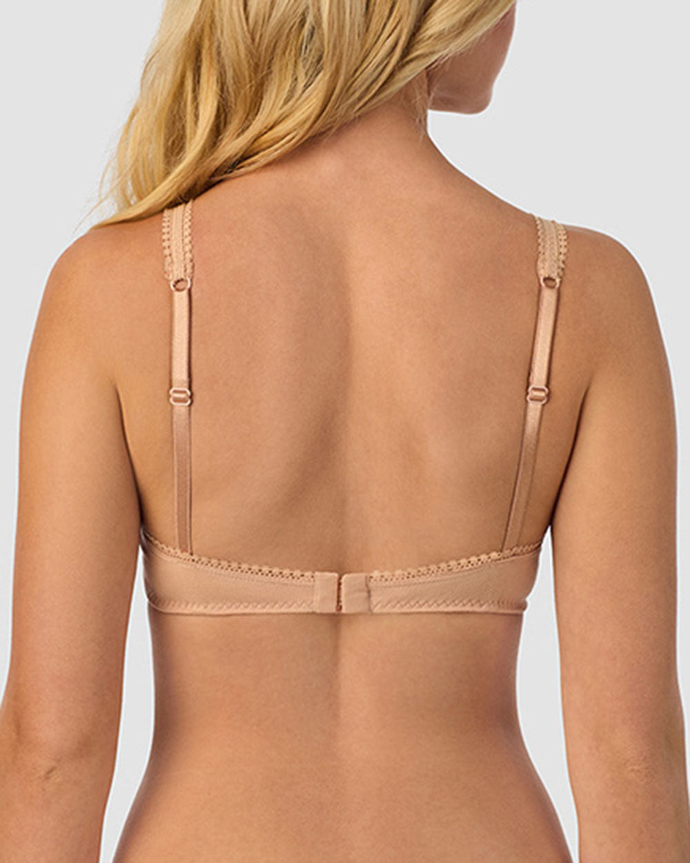 A lady wearing champagne cabana cotton bralette.