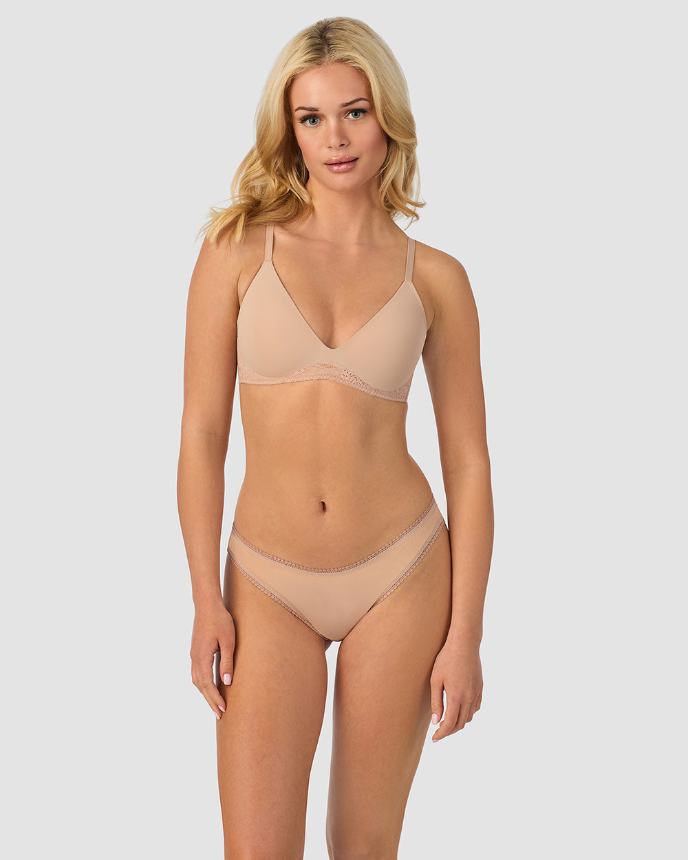 A lady wearing champagne Sleek & Lace Wire Free Lift