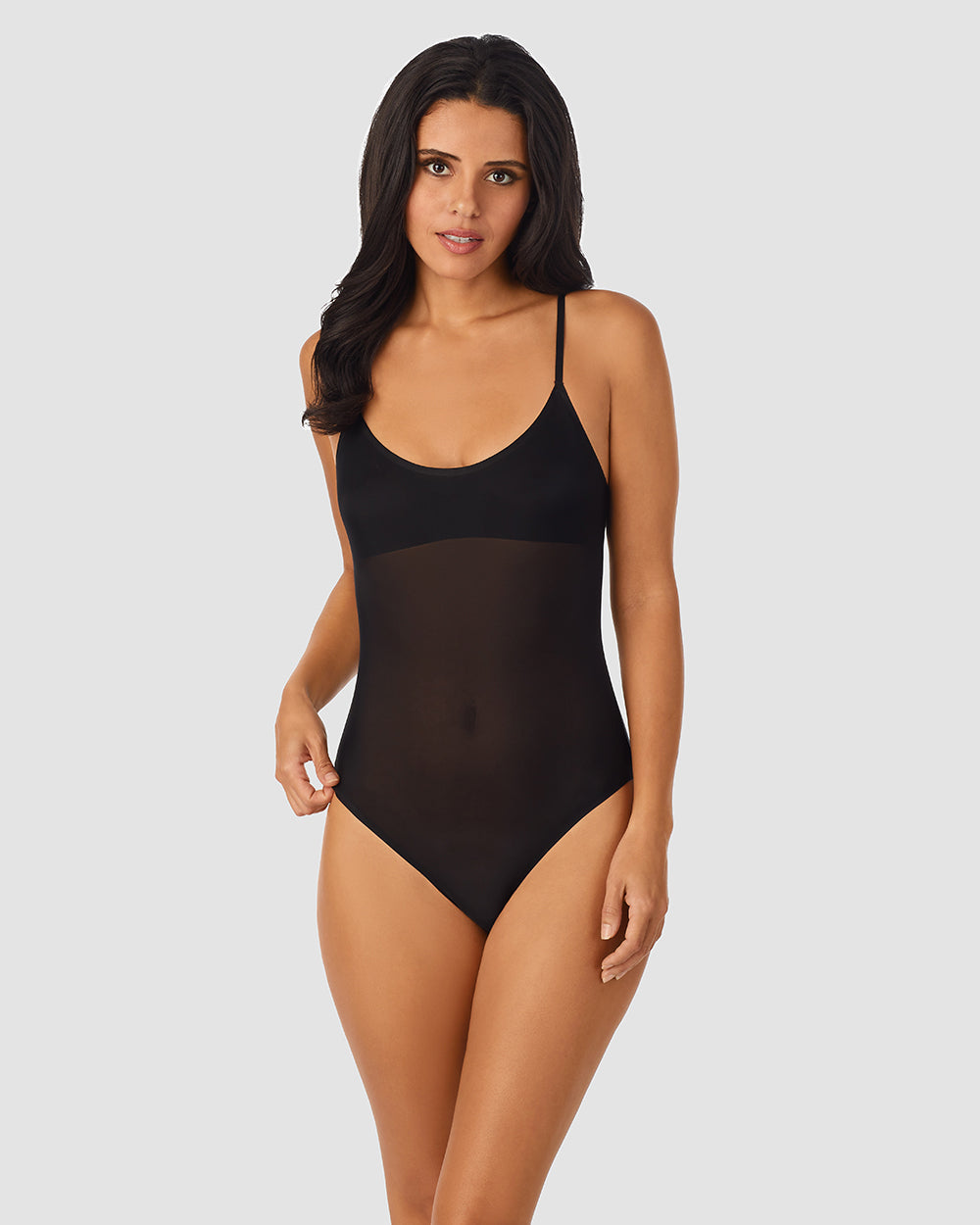 A lady wearing Black Heavenly Stretch Bodysuit