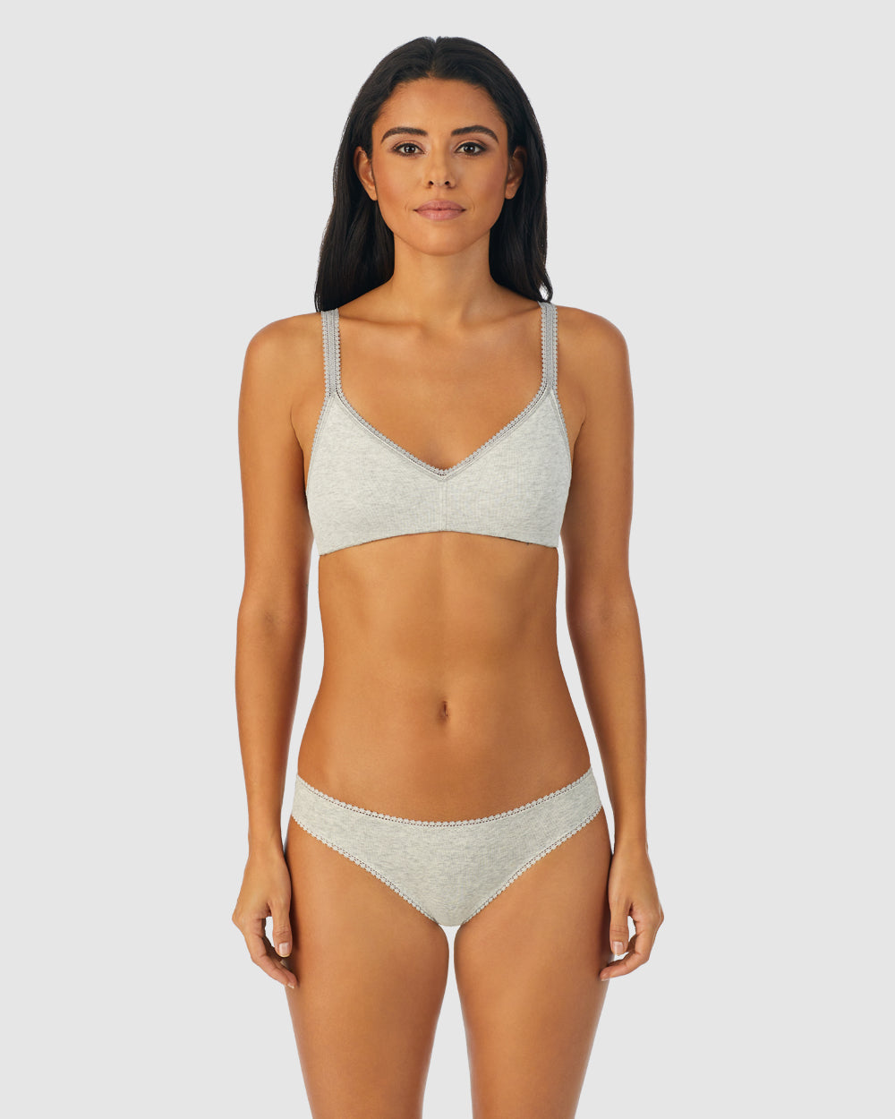 A lady wearing heather grey Cabana Cotton Bralette