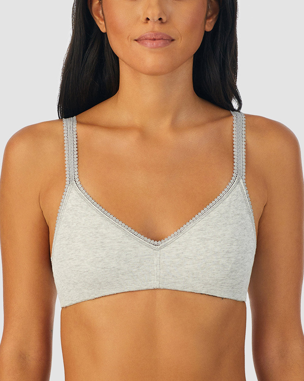 A lady wearing heather grey Cabana Cotton Bralette