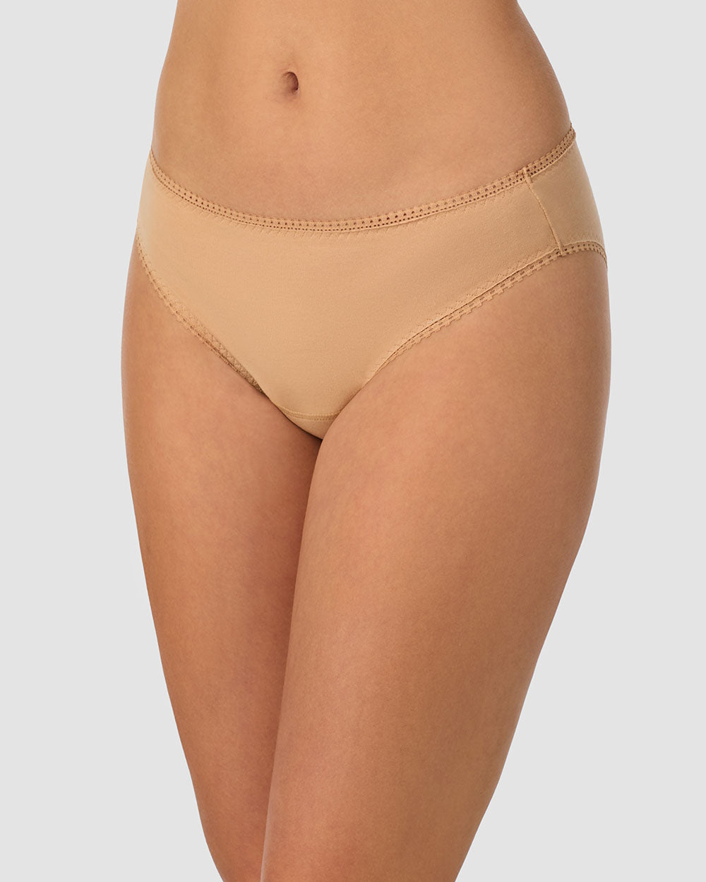 A lady wearing champagne Cabana Cotton Leak Proof bikini