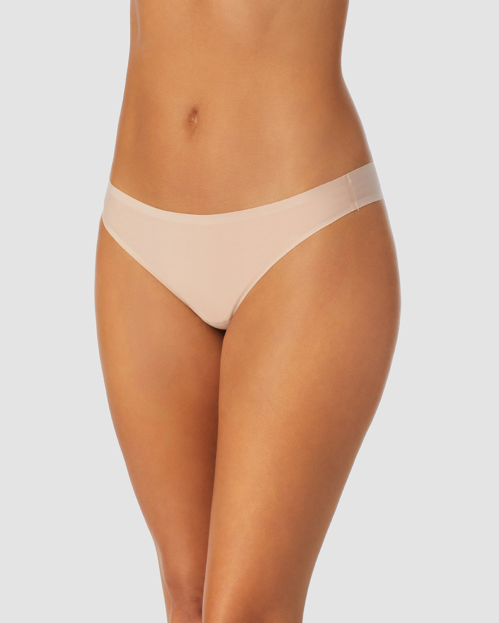 A lady wearing Champagne Heavenly Stretch Thong