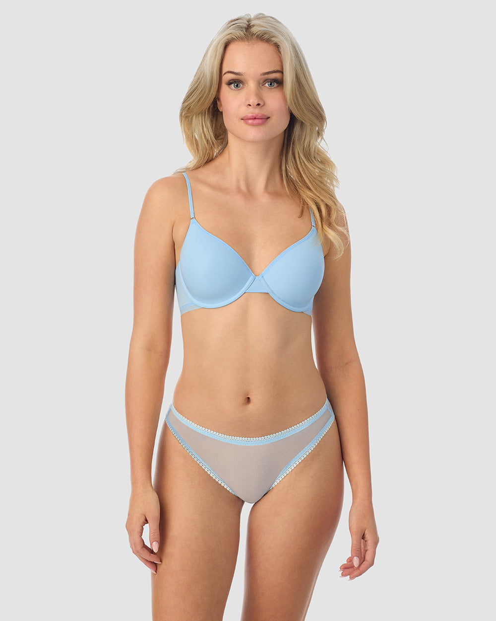 A lady wearing blue Next to Nothing Micro T-Shirt Bra