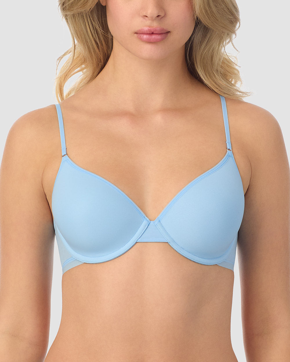 A lady wearing blue Next to Nothing Micro T-Shirt Bra