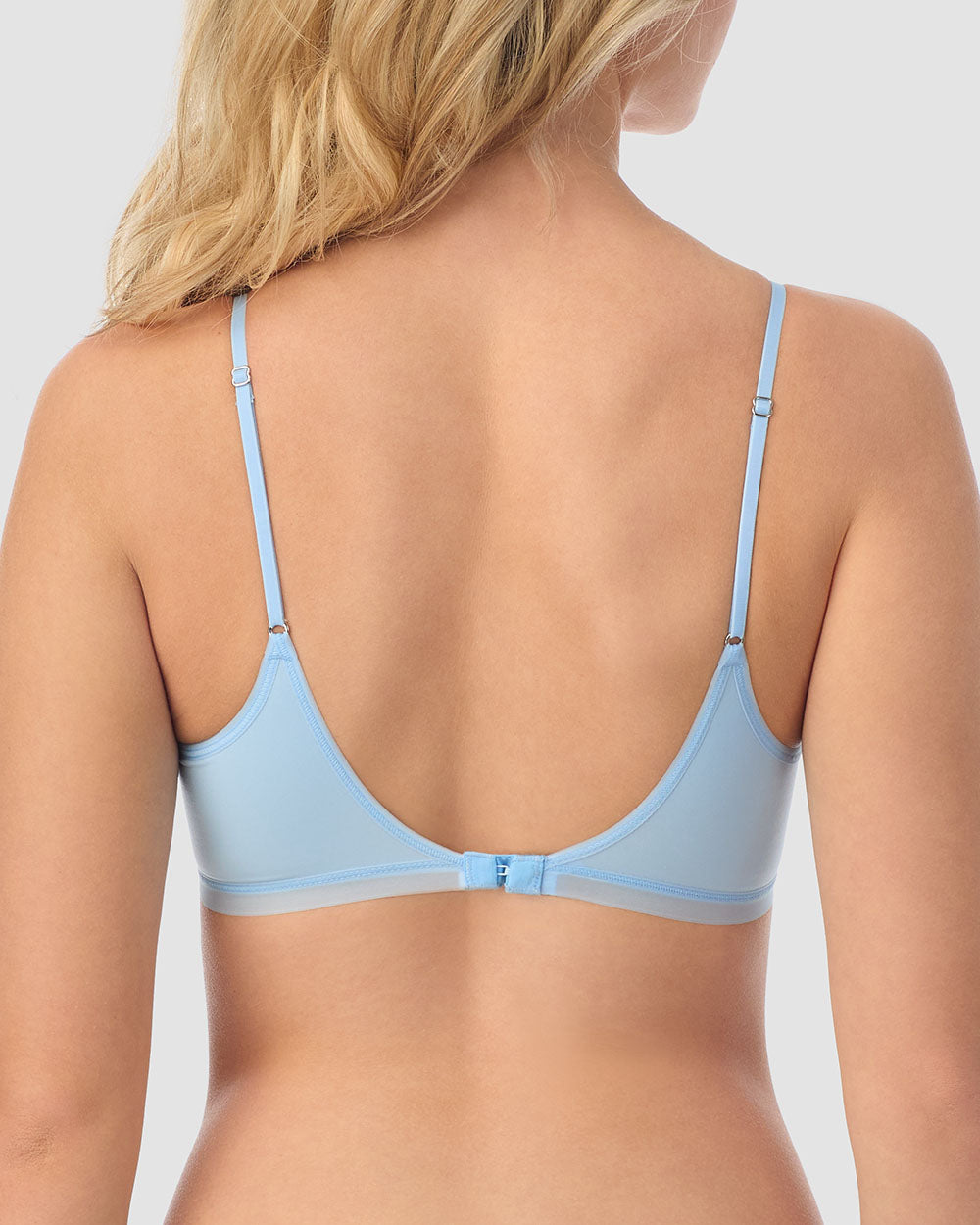 A lady wearing blue Next to Nothing Micro T-Shirt Bra