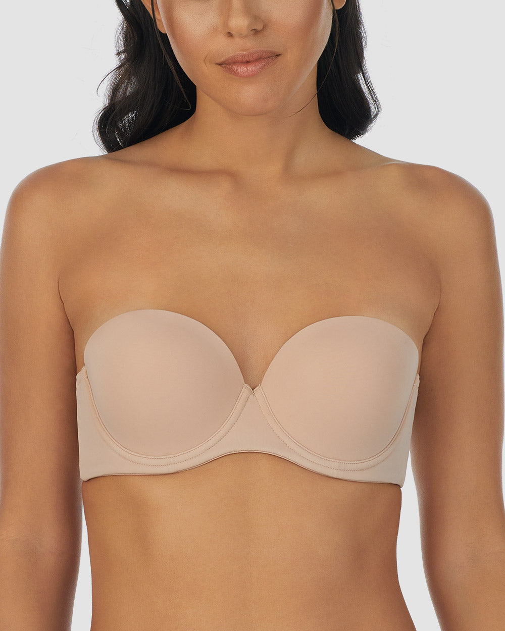 A lady wearing champagne Sleek Micro Strapless Plunge