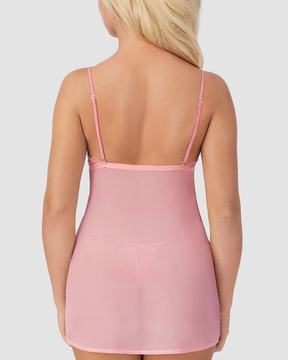 A lady wearing Luxe Lace Chemise String Thong Set in Plumeria