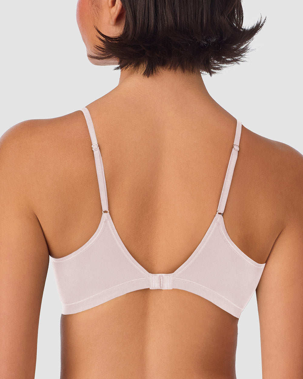 A lady wearing Next to Nothing Micro T Shirt Bra - Mauve Chalk back view