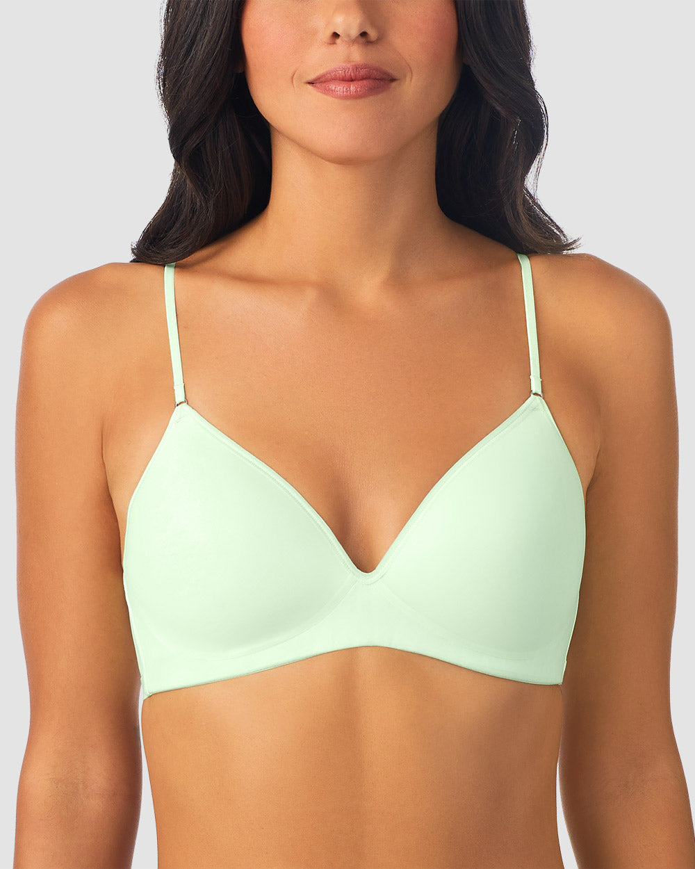 A lady wearing green Next To Nothing Micro Wireless Bra