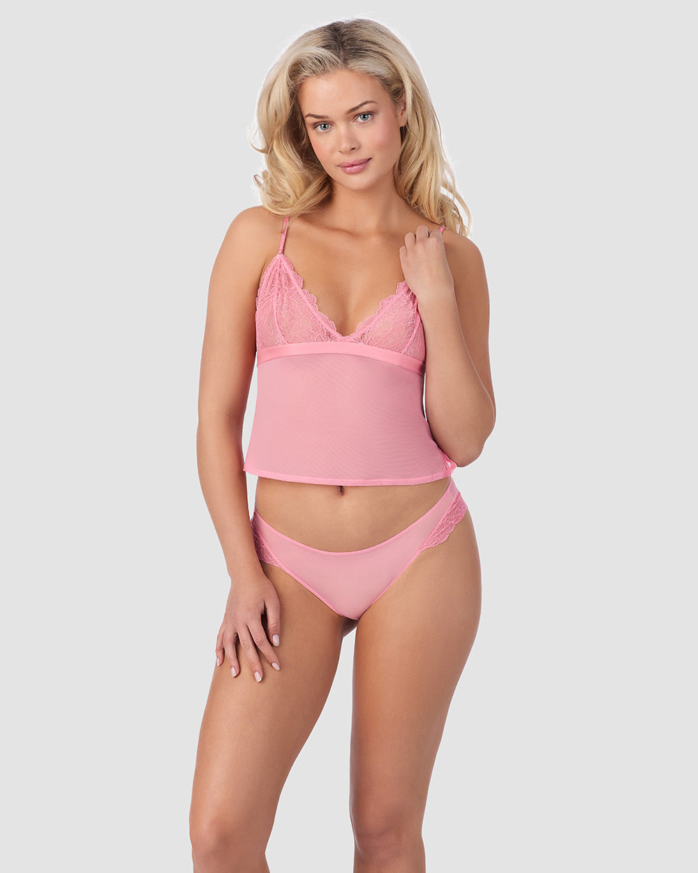 A lady wearing Luxe Lace Triangle Cami in Plumeria