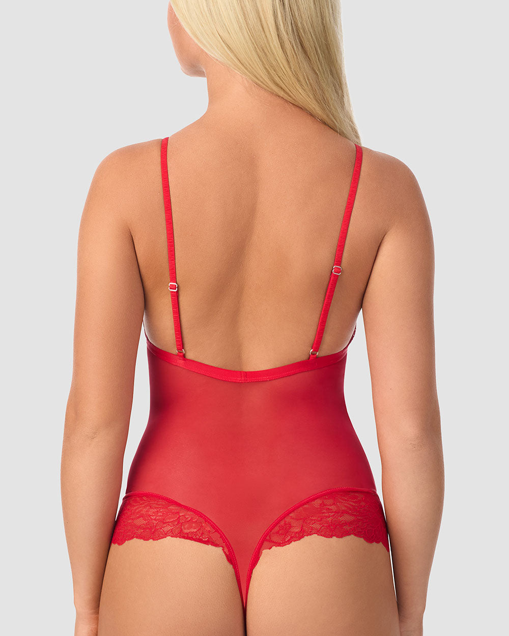 A lady wearing Luxe Lace Bodysuit - Crimson