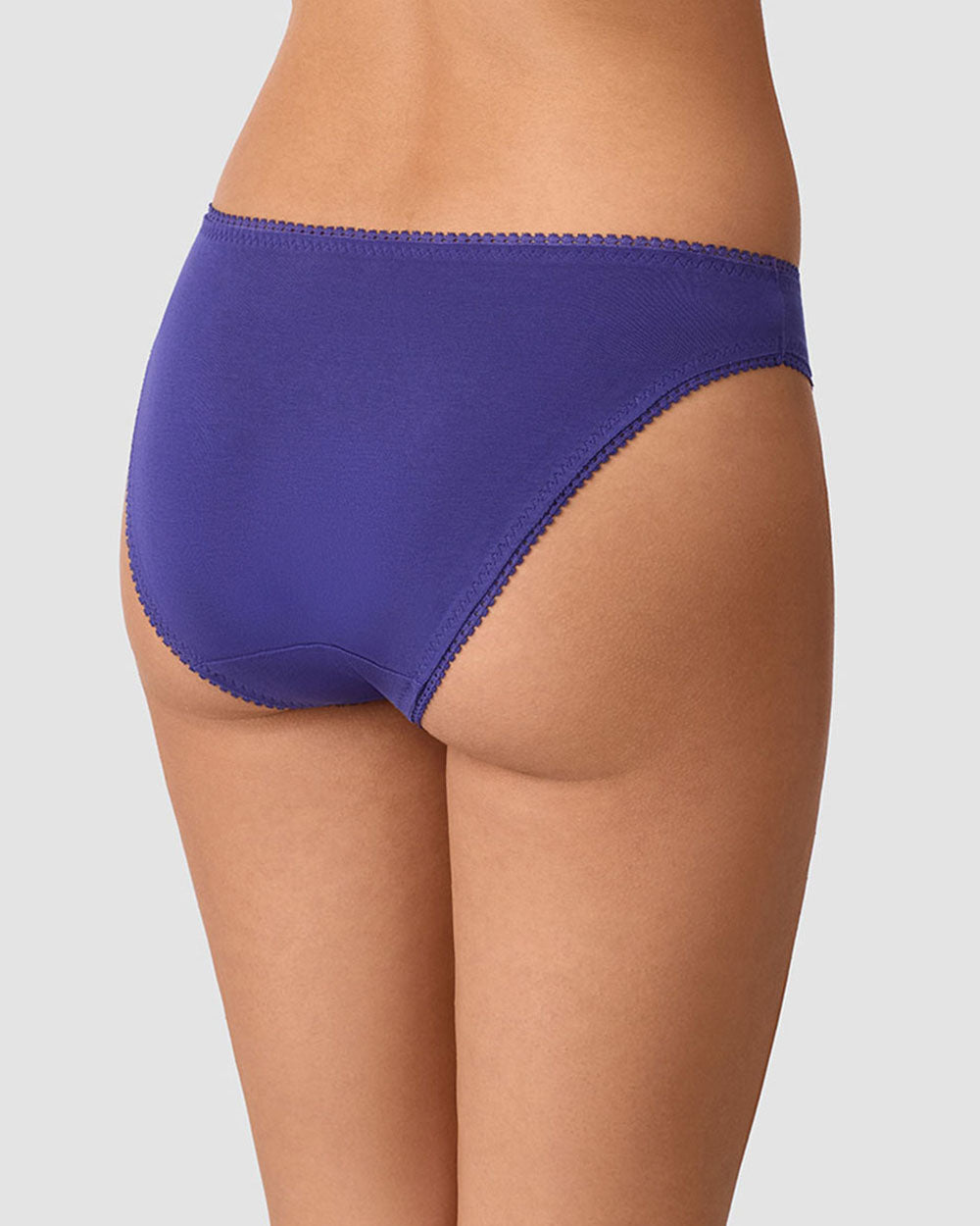 A lady wearing Cabana Cotton Hip Bikini Underwear - Deep Wisteria back view