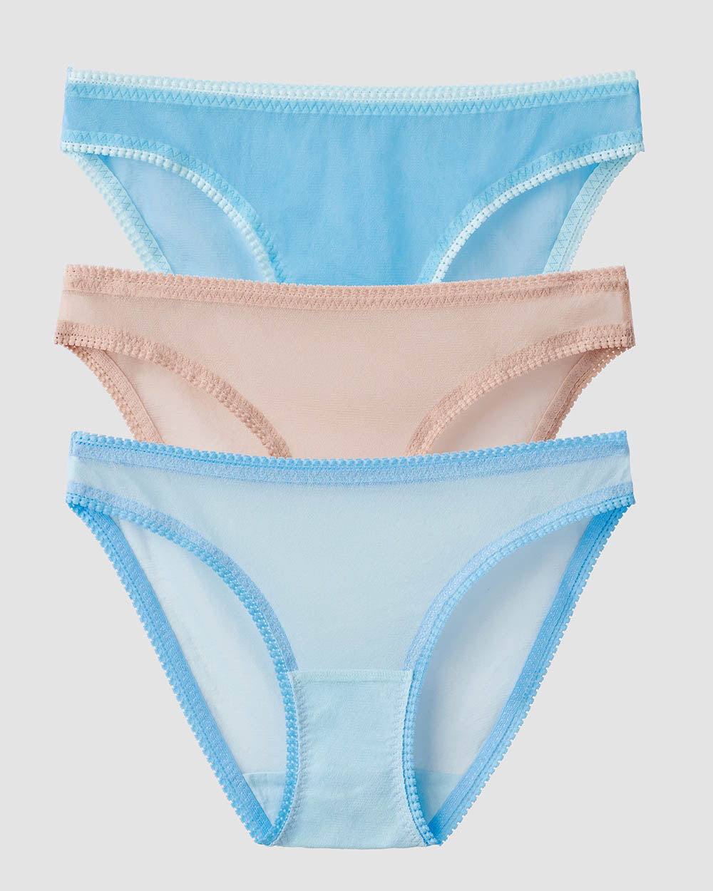 A lady is wearing Blue Hydrangea Icy Blue Champagne Gossamer Mesh Hip Bikini Underwear 3-Pack