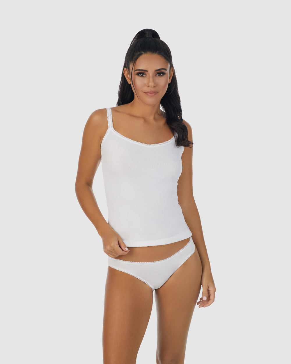 A lady wearing white Cabana Cotton Reversible Cami