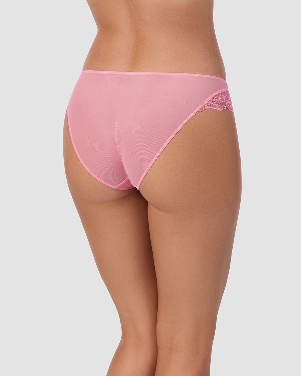 A lady wearing Luxe Lace Bikini in Plumeria