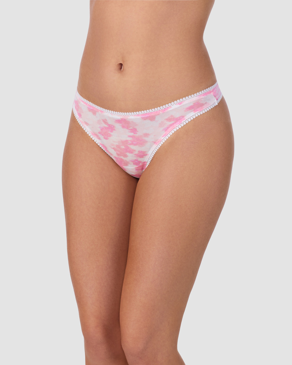A lady wearing Triple Mesh Hip G Thong Underwear in Blurred Floral