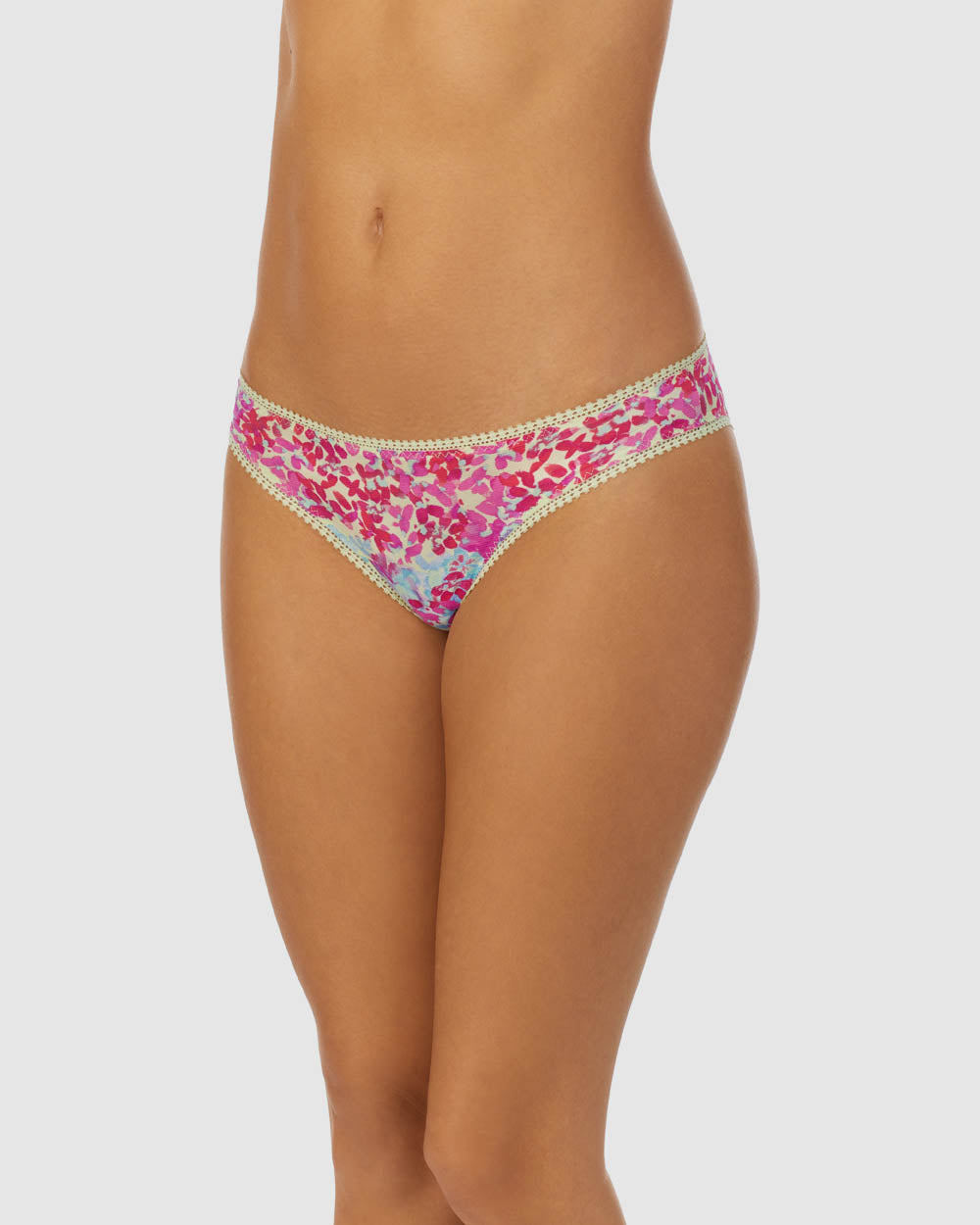 A lady wearing bright blooms Triple Mesh Hip G Underwear thong