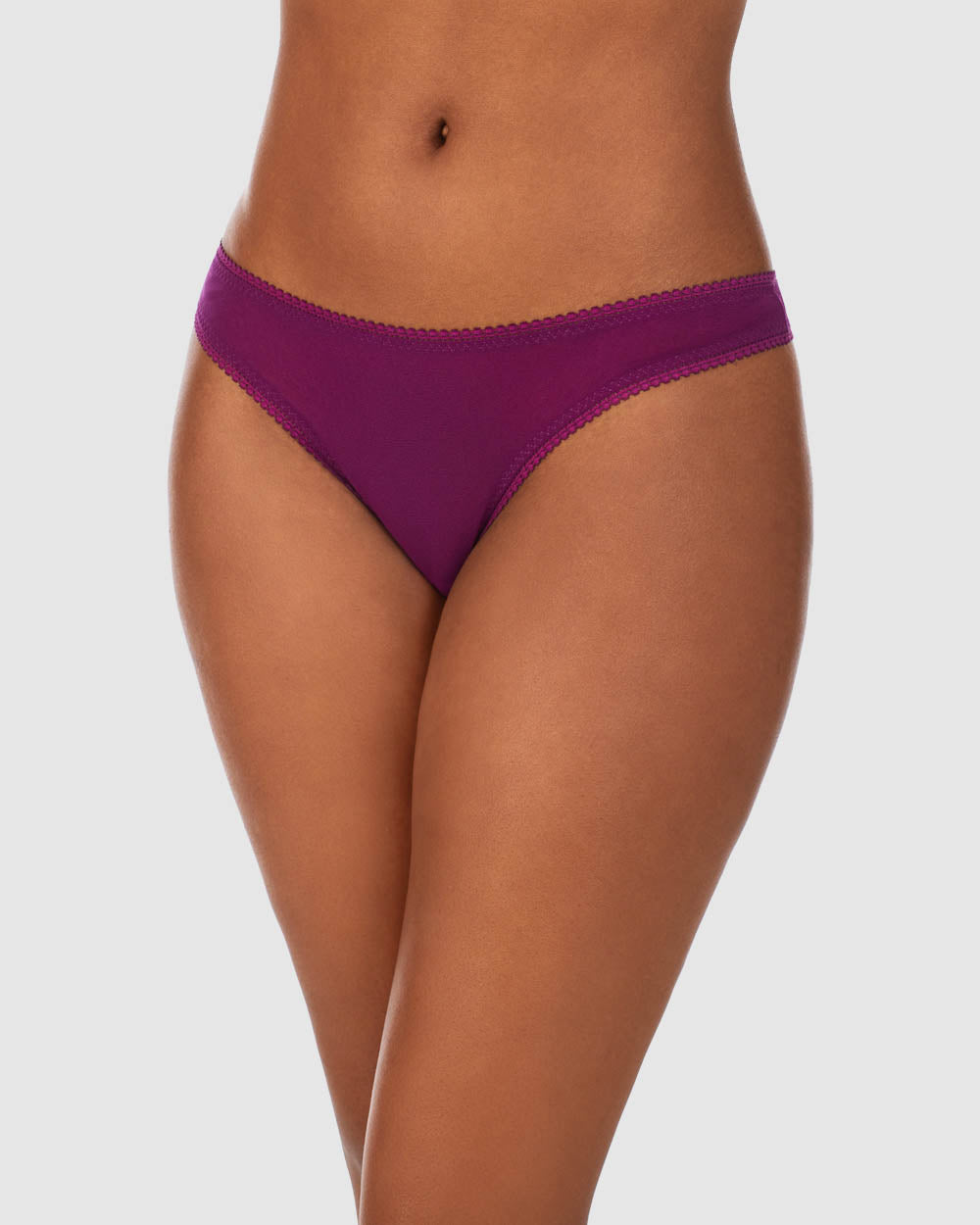 A lady wearing a Dark Purple Gossamer Mesh Hip G Thong Underwear