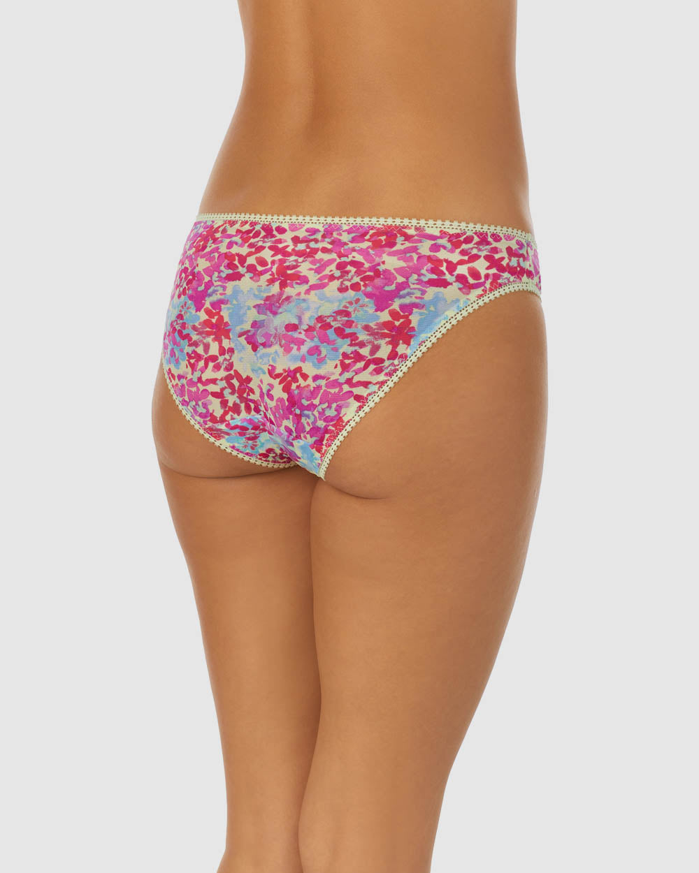 A lady wearing bright blooms Triple Mesh Hip Bikini Underwear