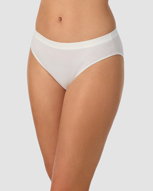 A lady wearing white Cabana Cotton Rib Bikini