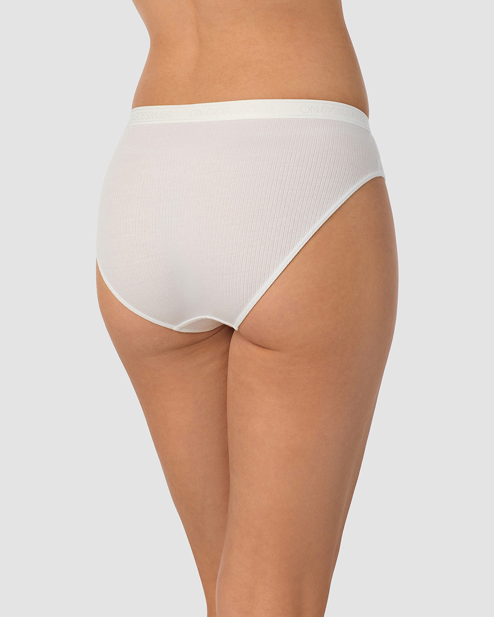 A lady wearing white Cabana Cotton Rib Bikini