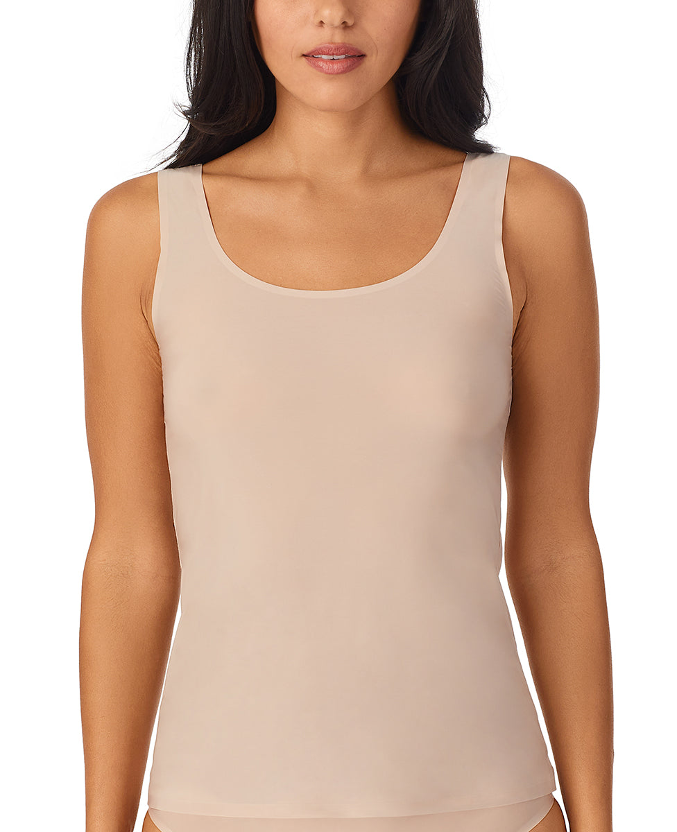 A lady wearing Champagne Heavenly Stretch Tank