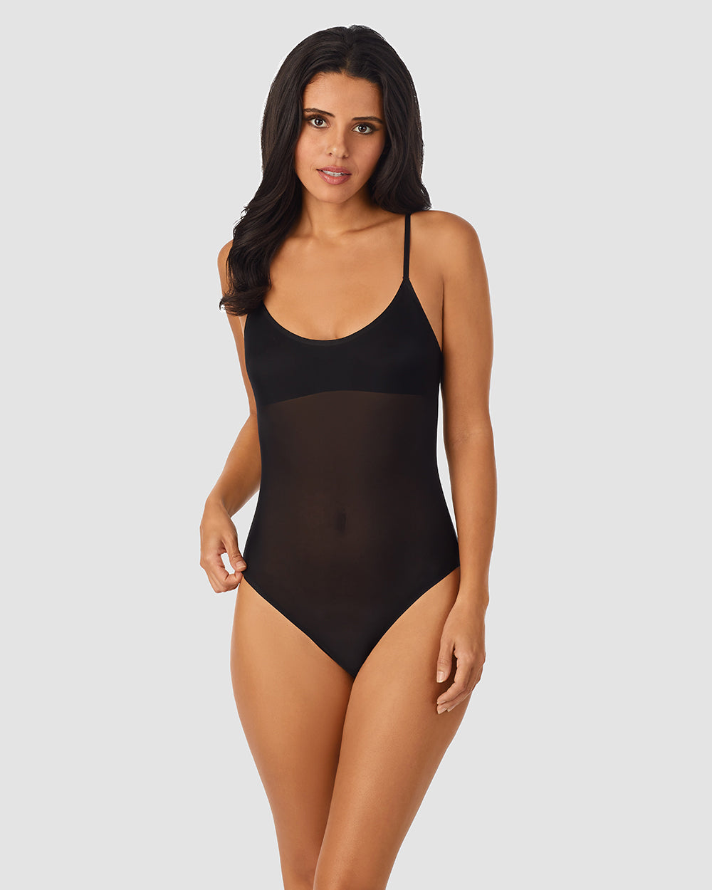 A lady wearing  Black Heavenly Stretch Bodysuit