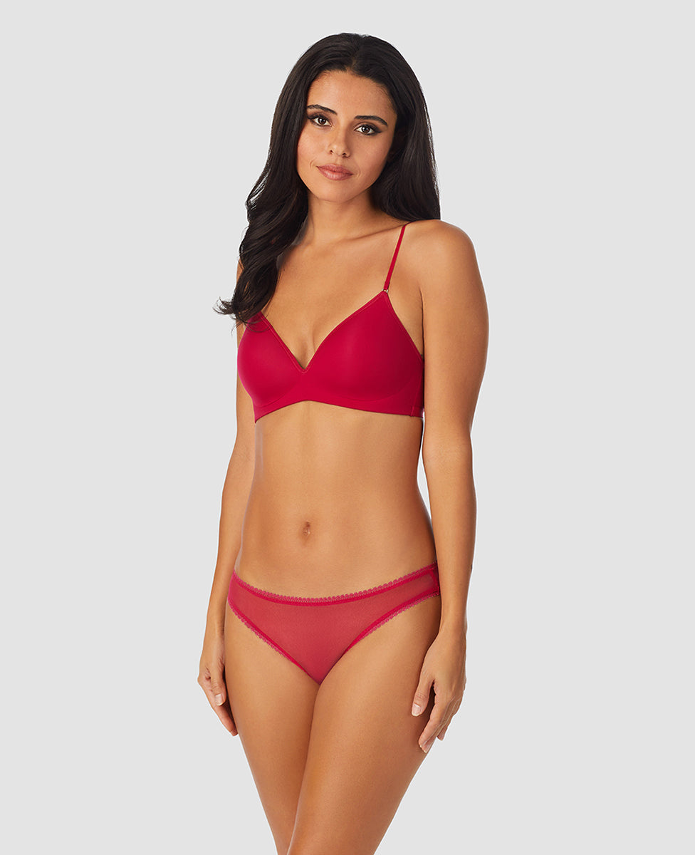 A lady wearing red hot next to nothing micro wireless bra