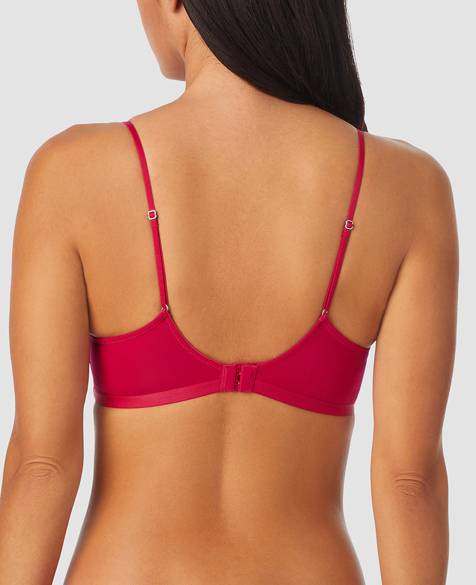 A lady wearing red hot next to nothing micro wireless bra