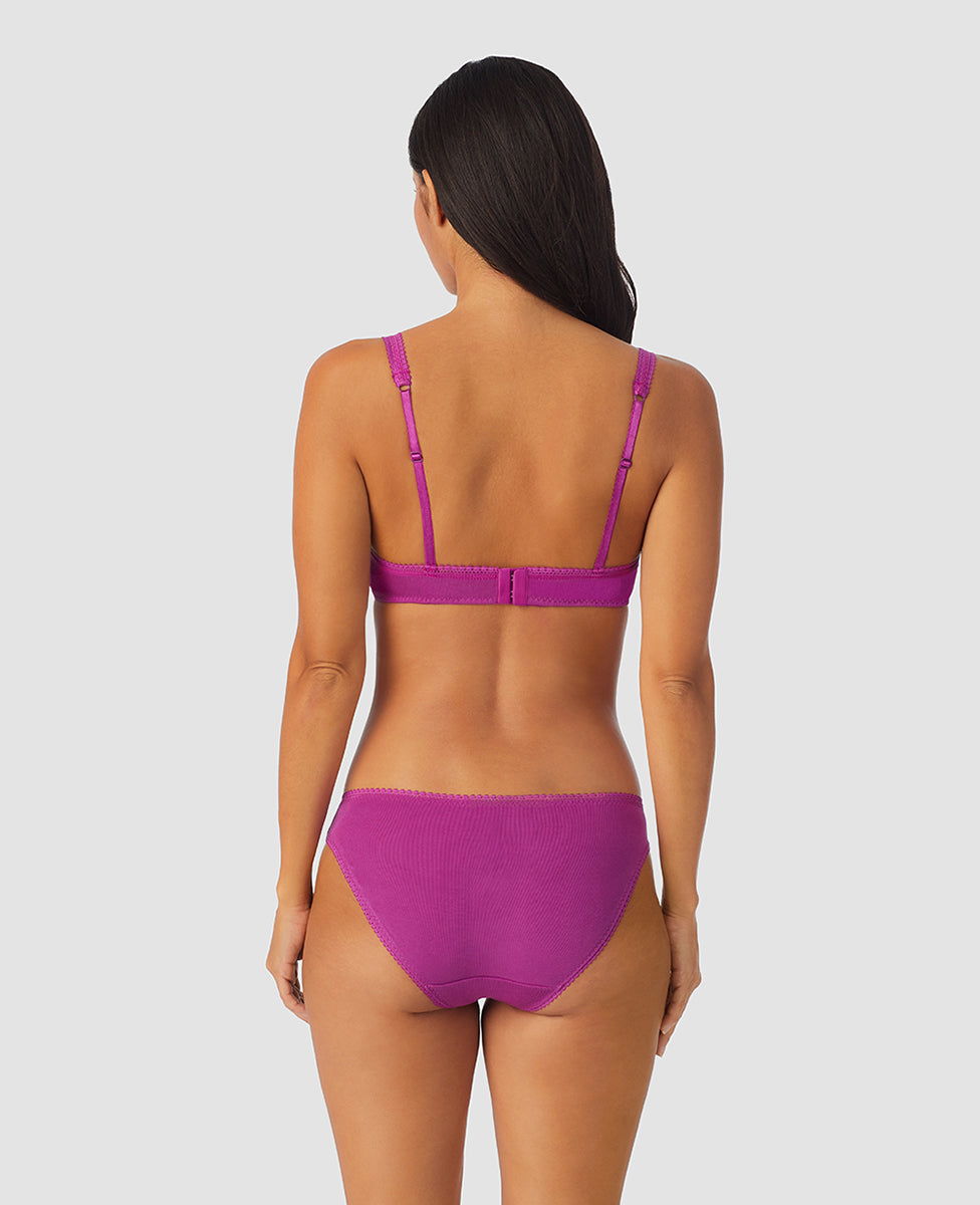 A lady wearing purple wine cabana cotton bralette.