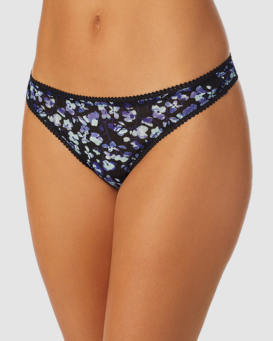 A lady wearing Triple Mesh Hip G Thong Underwear in evening blossom print