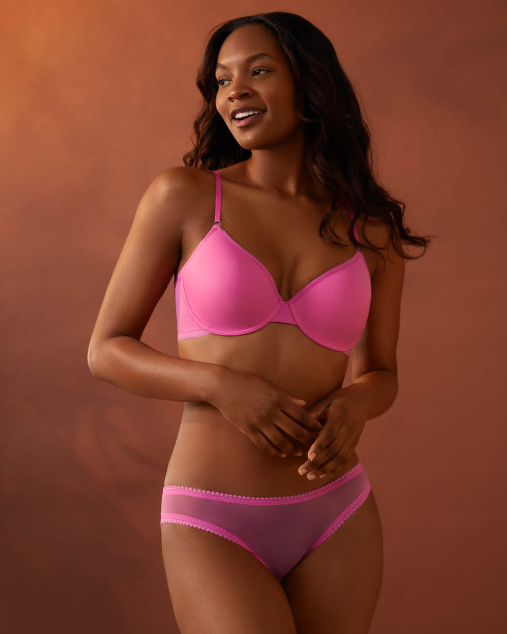 A lady wearing Bright Pink Next To Nothing Micro T-Shirt Bra