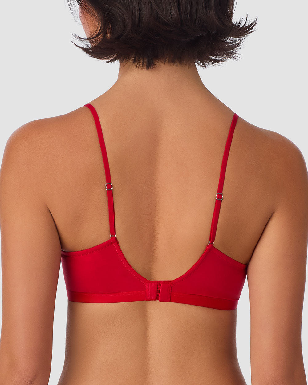 A lady wearing Next to Nothing Micro Wireless Bra back view