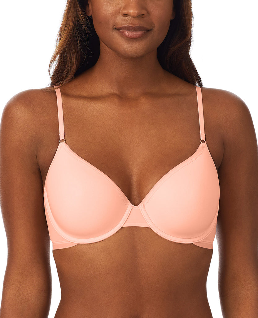 A lady wearing a peach pearl next to nothing micro t-shirt bra.