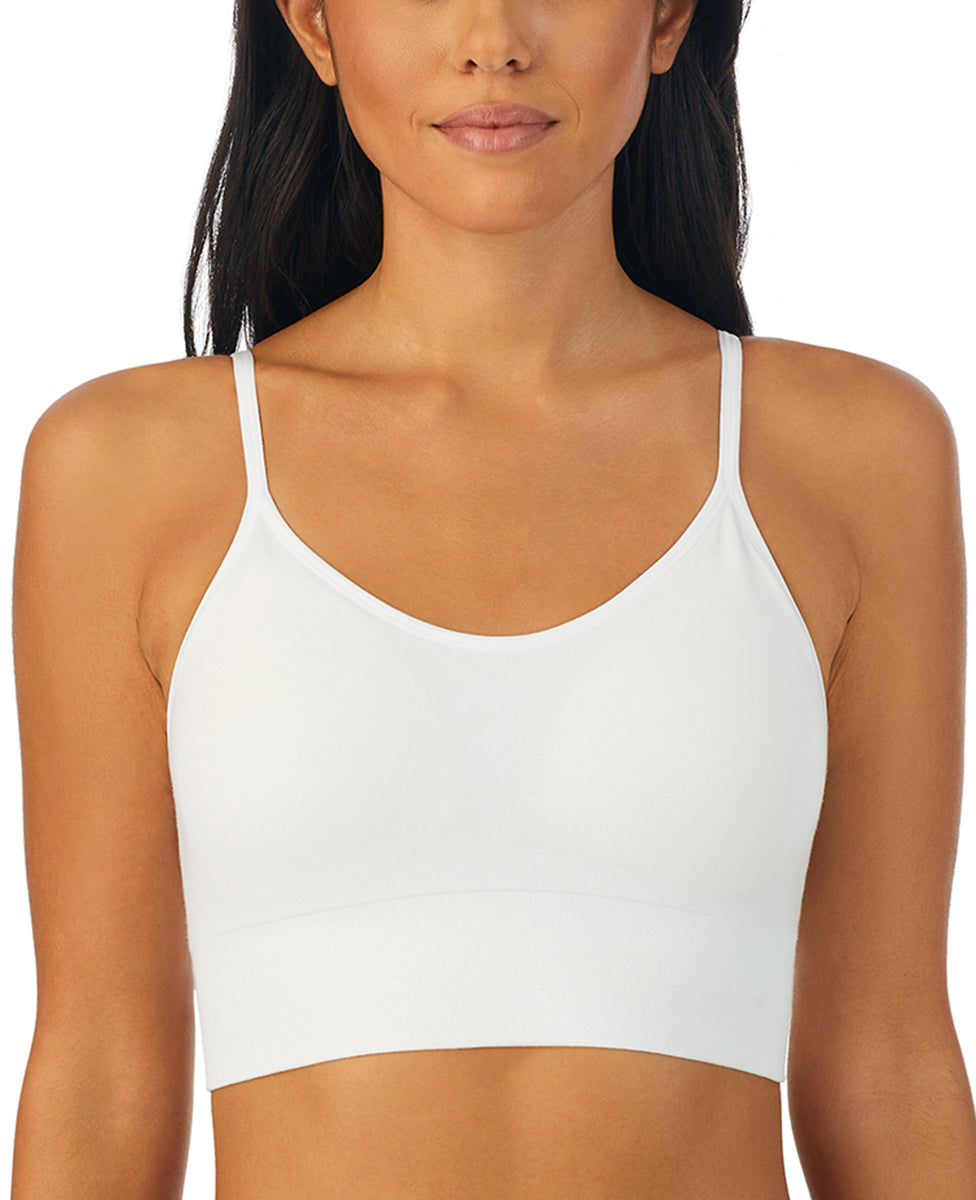 A lady wearing white Cabana Cotton Seamless Longline Bralette