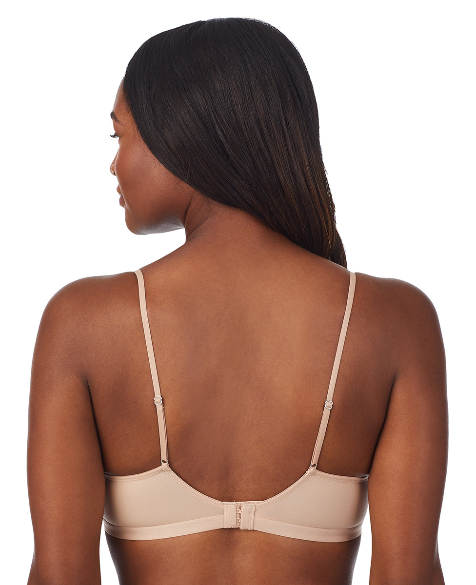 A lady wearing champagne next to nothing micro wireless bra.