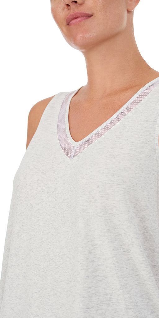 A lady wearing Heather Grey Mesh Trim Tank