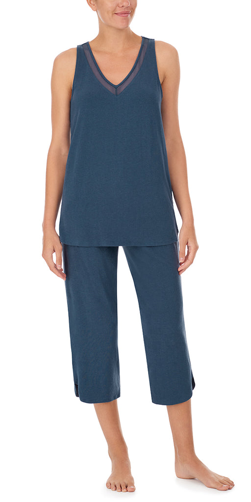 A lady wearing Slate Navy Mesh Trim Tank